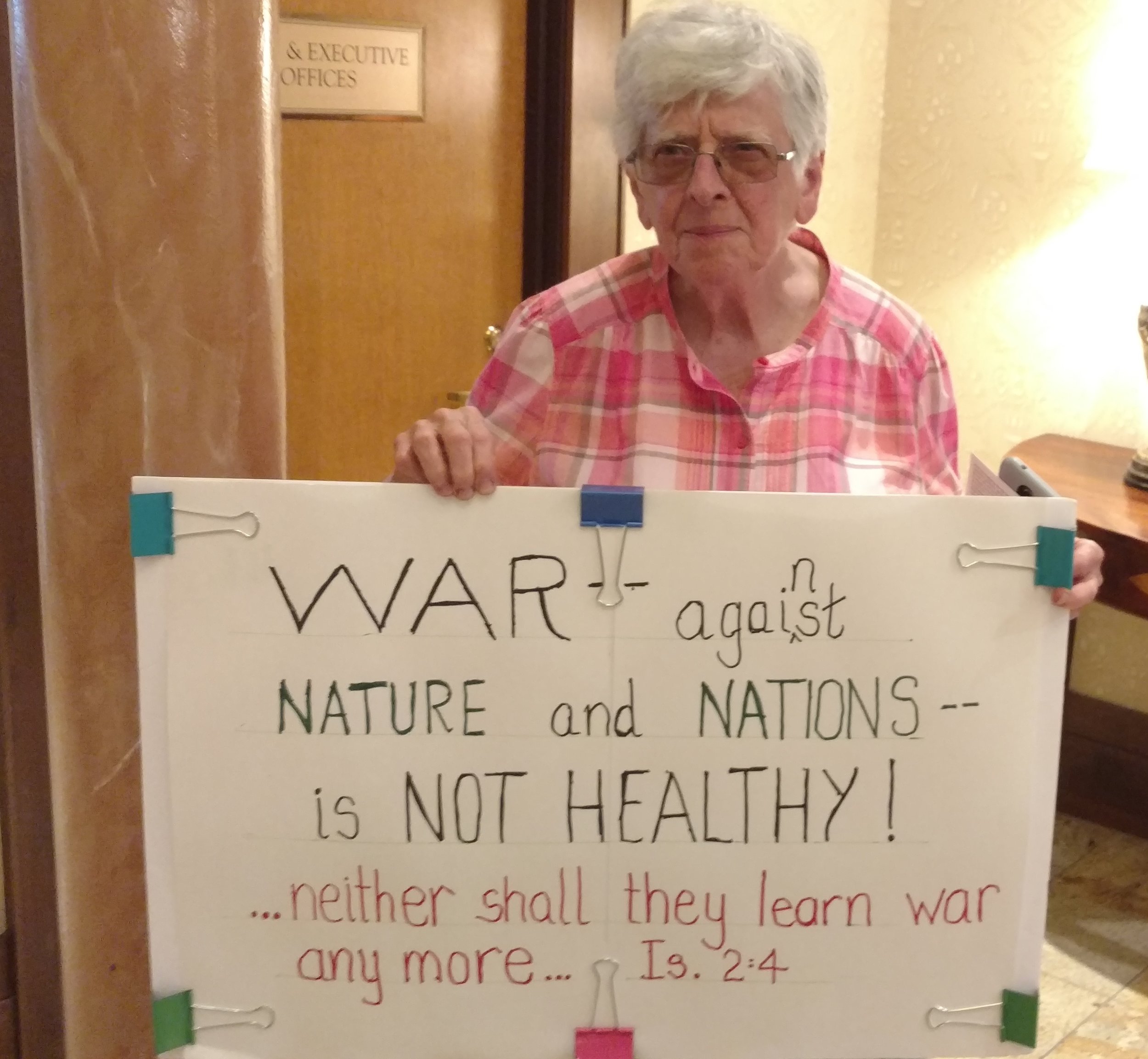 Pat Fontes of Providence outside the July 19 public hearing on the environmental impact statement for Navy training and testing program. (Tim Faulkner/ecoRI News)
