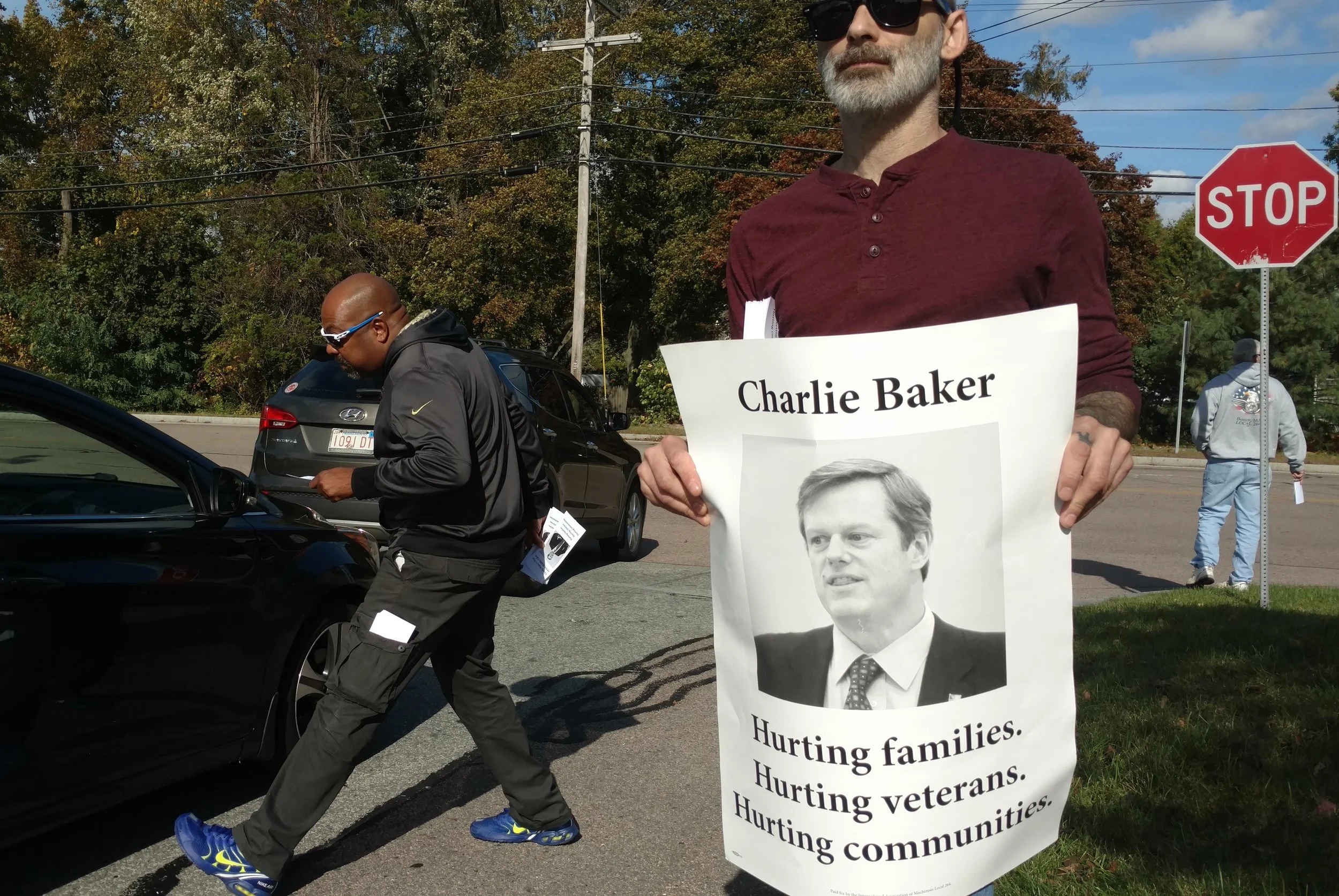 The International Association of Machinists Union Local 264 protested Baker's efforts to privatize their jobs.