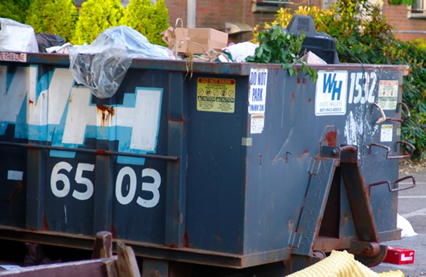 Dumpsters on the campuses of Rhode Island’s colleges and universities frequently include two items, recyclables and electronics, that shouldn’t be landfilled. Progress is being made, but, as this photo taken a few years ago of a Brown University Dumpster shows, there’s plenty of work that still needs to be done. (ecoRI News)