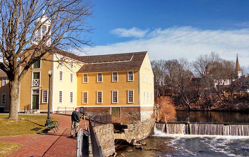 Slater Mill, a historic textile mill complex on the banks of the Blackstone River in Pawtucket, attracts some 30,000 visitors annually. (ecoRI News)