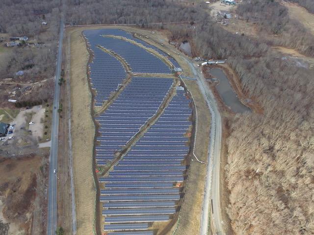 The Rose Hill landfill solar array, above, is 4.7 megawatts and the Plains Road landfill site is 4.6, for a total of 9.3 megawatts, or enough solar energy to power 1,250 homes. (Kearsarge Energy)