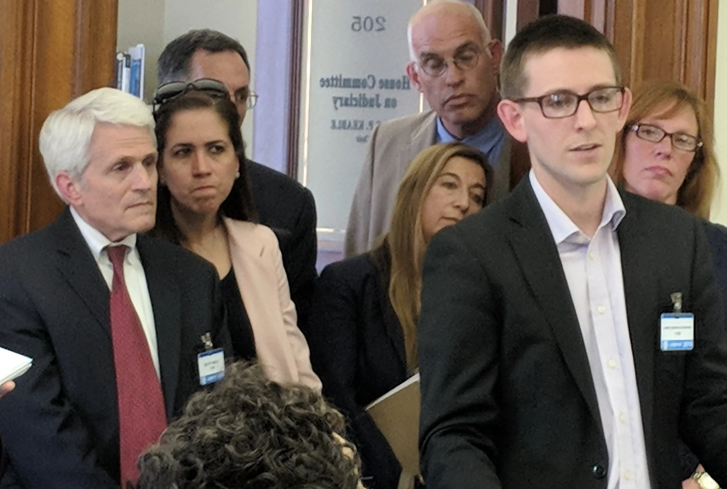 Scott Wolf, left, of Grow Smart Rhode Island supports a bill that restricts solar and wind projects in forests. Jamie Dickerson, right, of the Northeast Clean Energy Council said the bill could hurt the state's renewable-energy industry. (Tim Faulkner/ecoRI News photos)