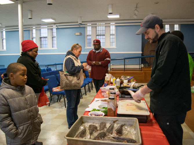 Eating with the Ecosystem held cooking demonstrations to introduce families to less well-known fish such as sea robin. (EWE)