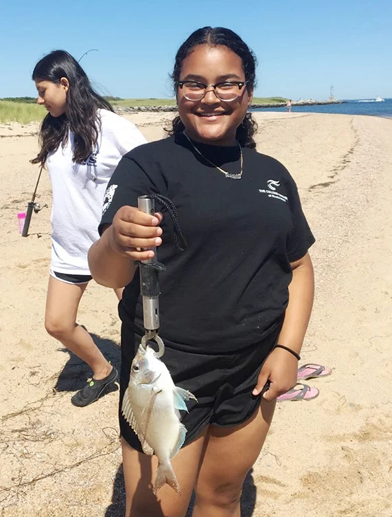 Students learn about common species of fish on Block Island and practice their fishing skills.