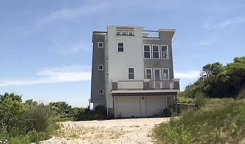 This $1.8 million waterfront house was built illegally in a public park in Narragansett. (AP)