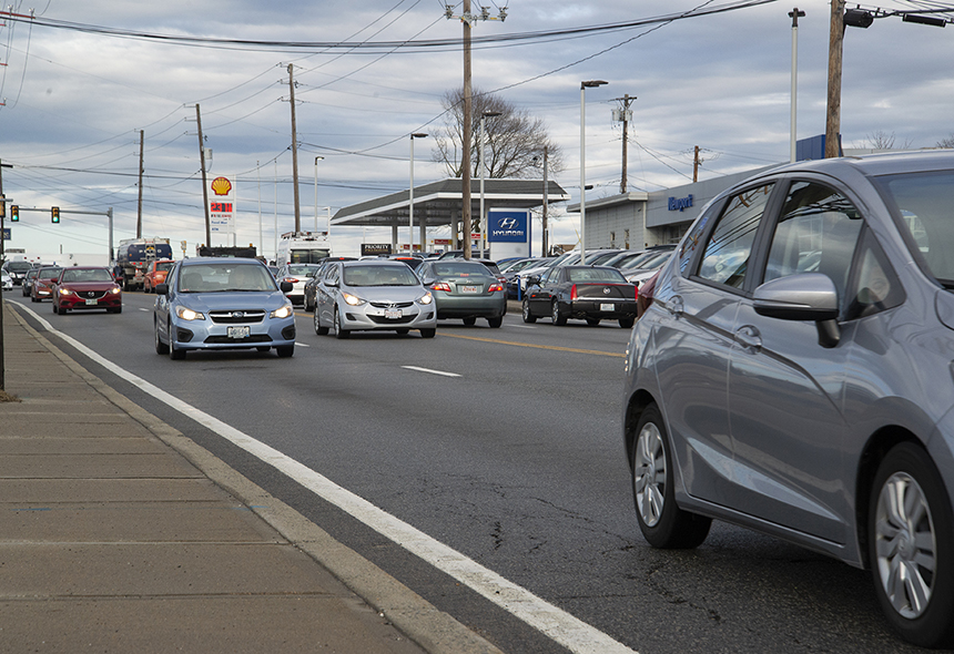 Sprawling suburbs and strip-mall highways, such as West Main Road in Middletown, made automotive transit popular. (Joanna Detz/ecoRI News)