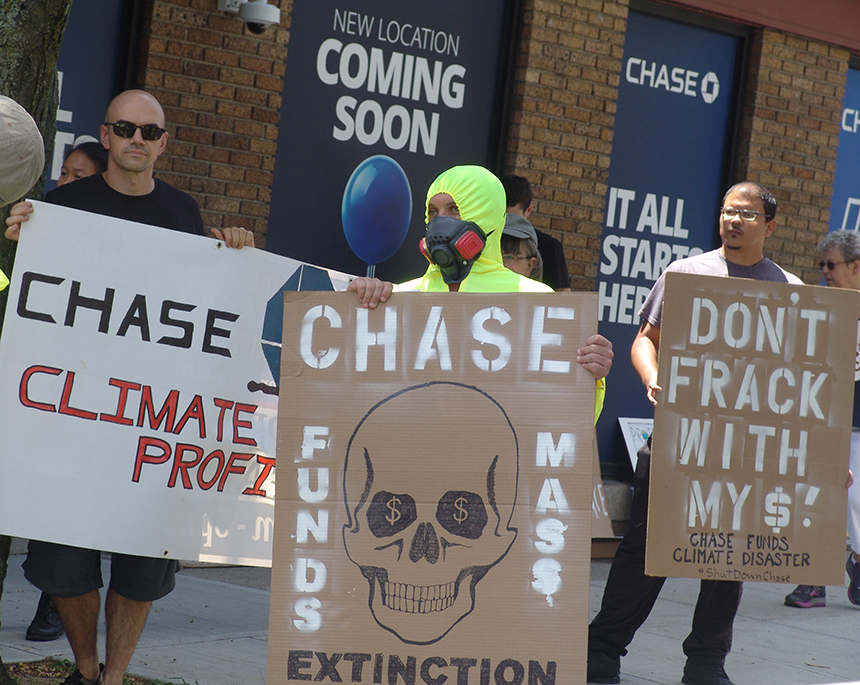 The protest was held at the location where Chase Bank is set to open its first Rhode Island branch, 234 Thayer St. in Providence. The activists want Rhode Islanders to reject the New York City bank until it changes its practices.