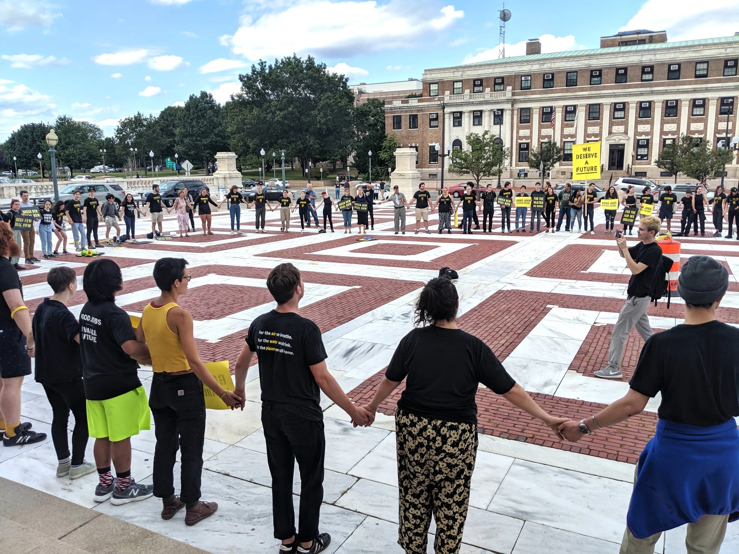 A weekend of training for climate activists ended with a sit-in and rally at the Statehouse in Providence. (Tim Faulkner/ecoRI News photos)