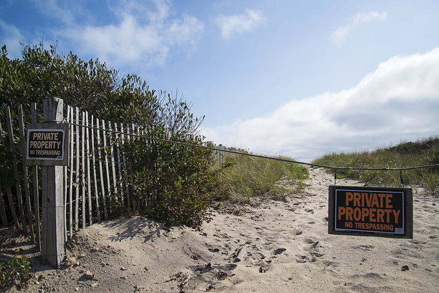 A bevy of signs up and down Charlestown Beach Road all say the same thing. (Joanna Detz/ecoRI News photos)
