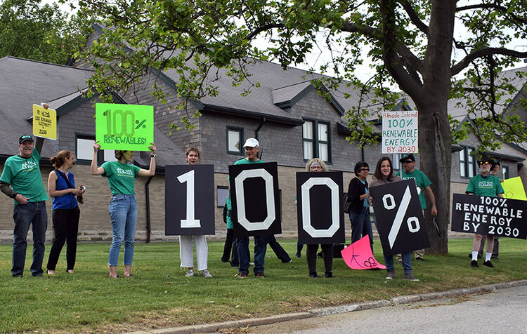 A rally organized by Climate Action Rhode Island was held outside Sapinsley Hall at Rhode Island College, where Senate sessions have been held during the COVID-19 closure of the Statehouse. (Brian P. D. Hannon/ecoRI News)