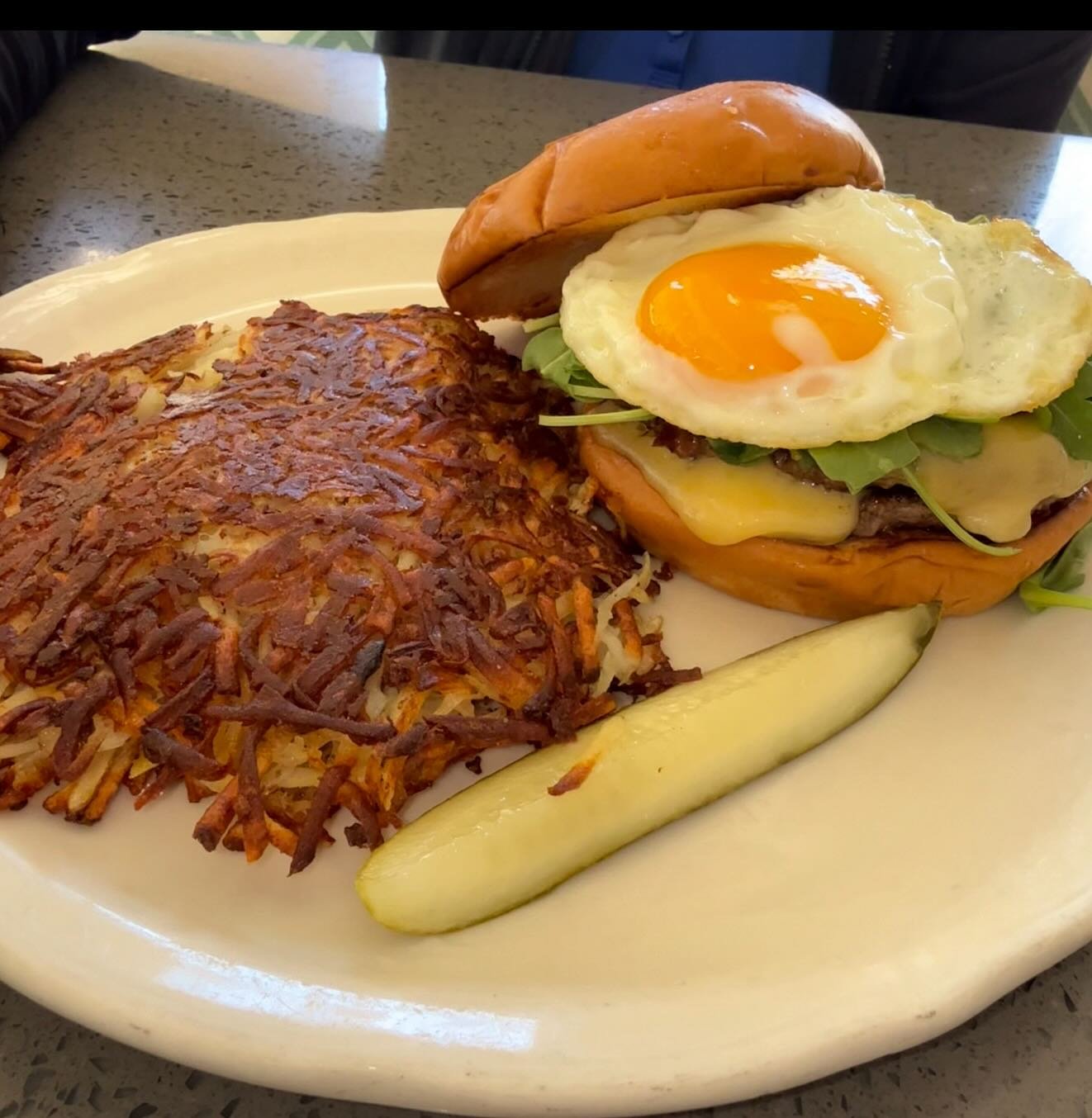 @richardwalkerspancakehouse . Waygu Smash Burger with @jackiesjams Spicy Raspberry Sauce, Bacon, Caramelized Onion, Havarti, Arugula and a Sunnyside Up Egg. Served with hashbrowns and a pickle. 

Being served at their La Jolla, Del Mar and Carlsbad L