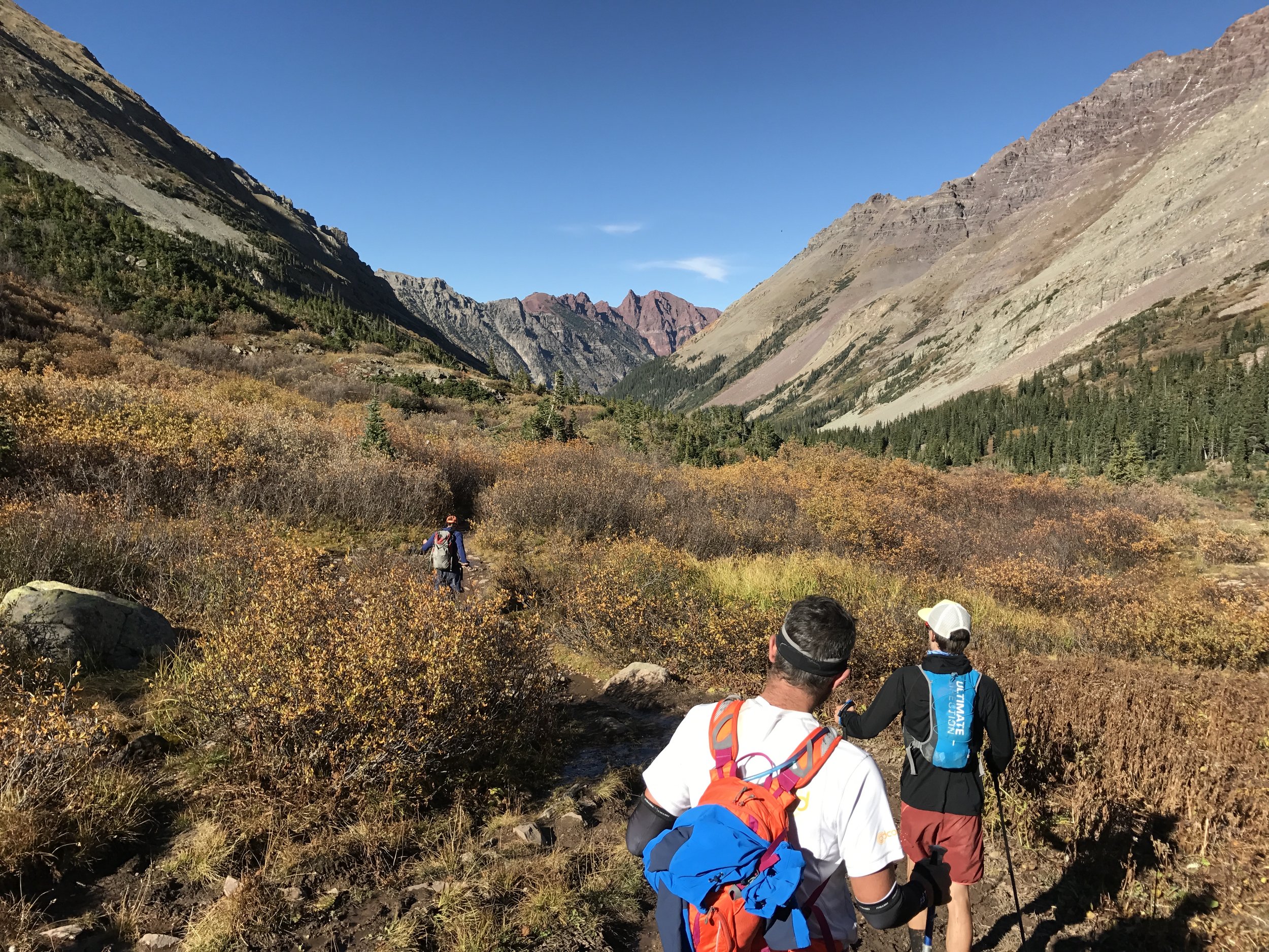 Pushing through the last few miles in the shadow of the Maroon Bells.