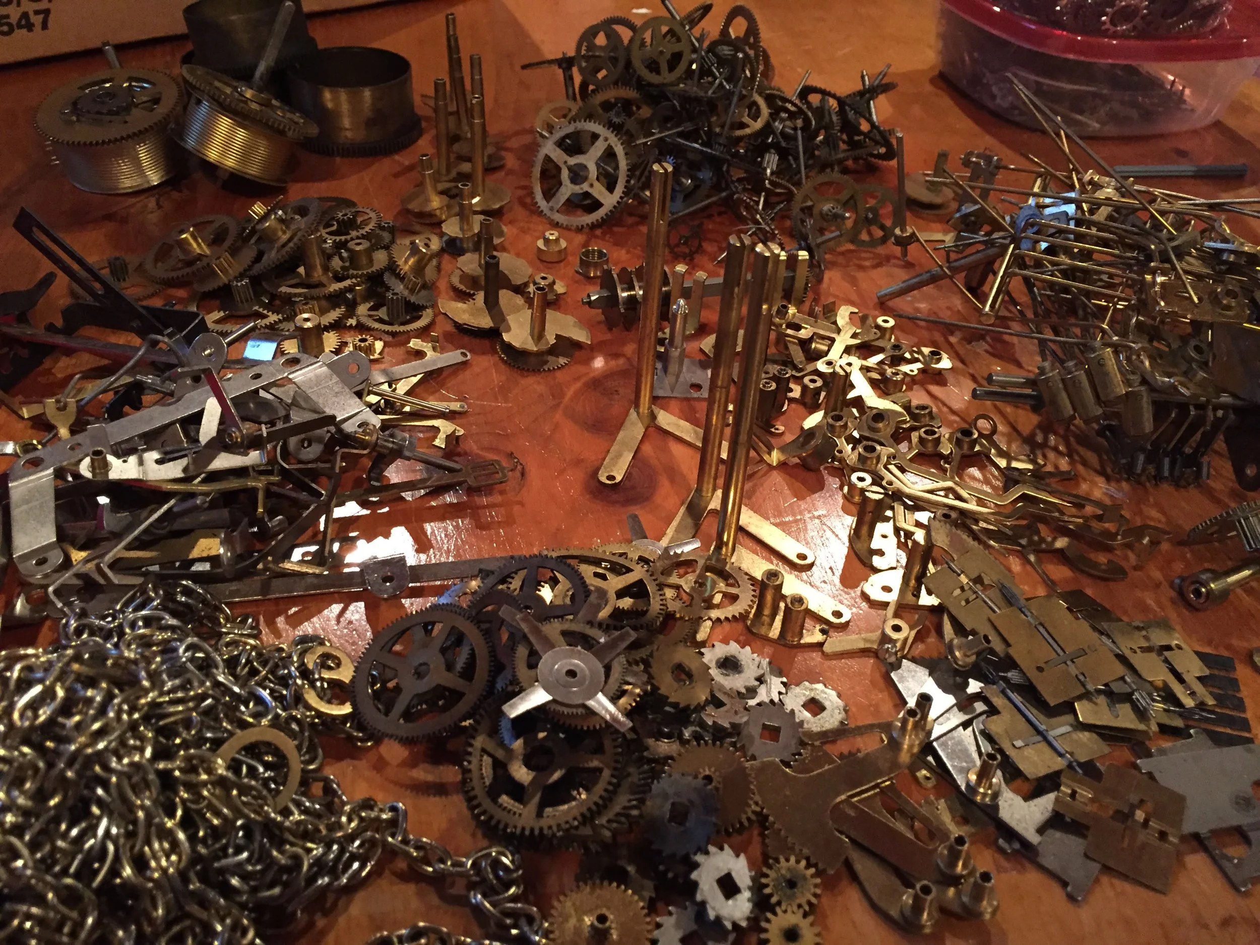 Collection of Clockparts sorted. Photo by Melody Weintraub (2017)