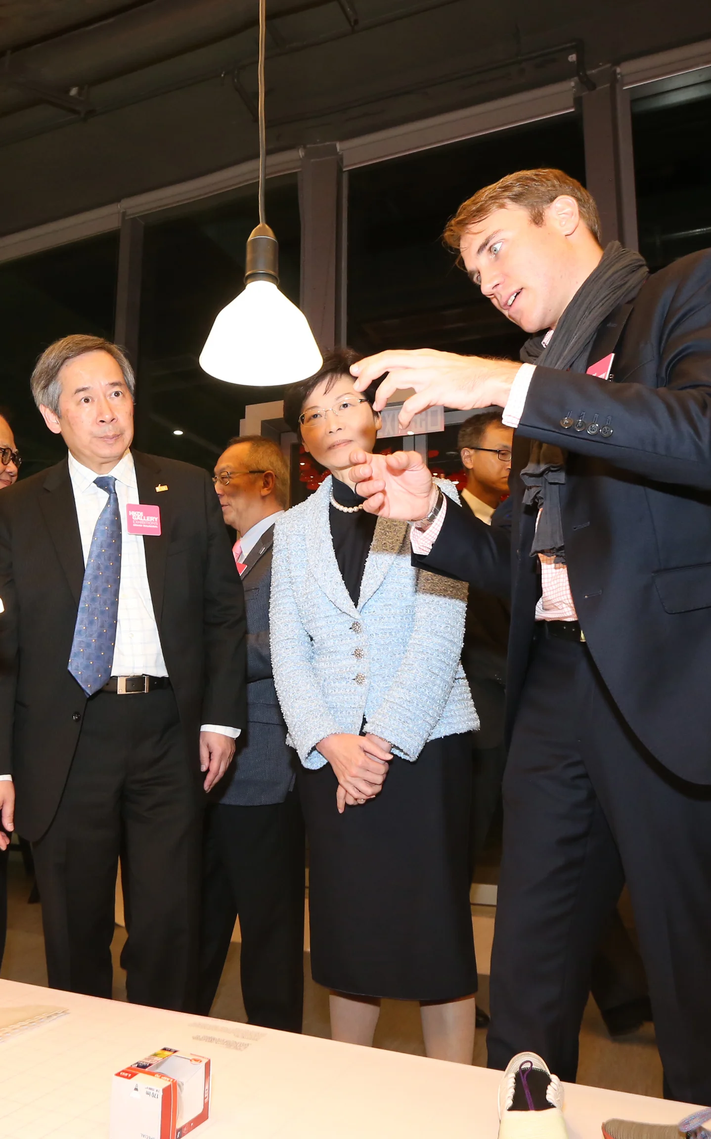 Mr Alexis Georgacopoulos ( Director of ECAL ) is explaining my project to Mrs. Carrie Lam Cheng Yuet-ngor ( Chief Secretary for Administration, Hong Kong ).