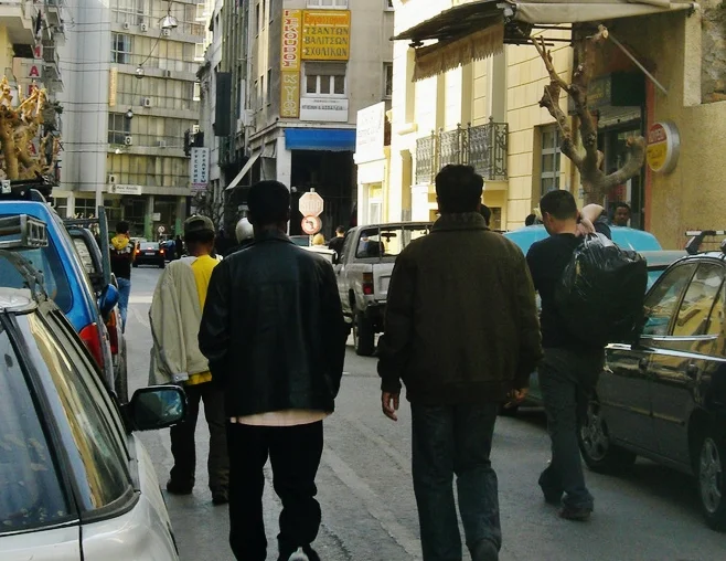 refugees rarely move about the city alone but seek the safety of a group.