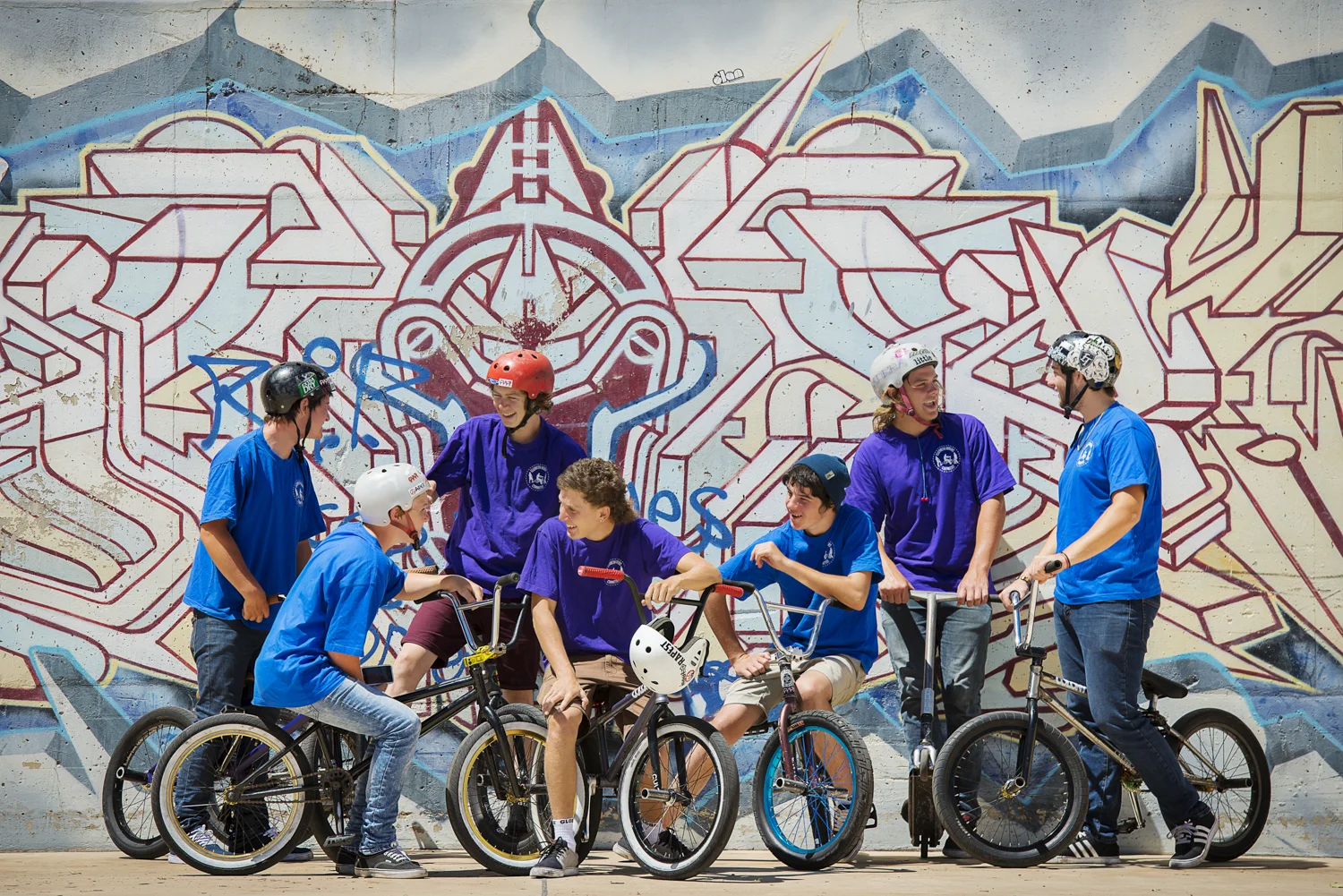 Notice the groups of triangles formed within the placement of heads. Imagine if this photo had all the bike riders lined up in a straight line - boring. 