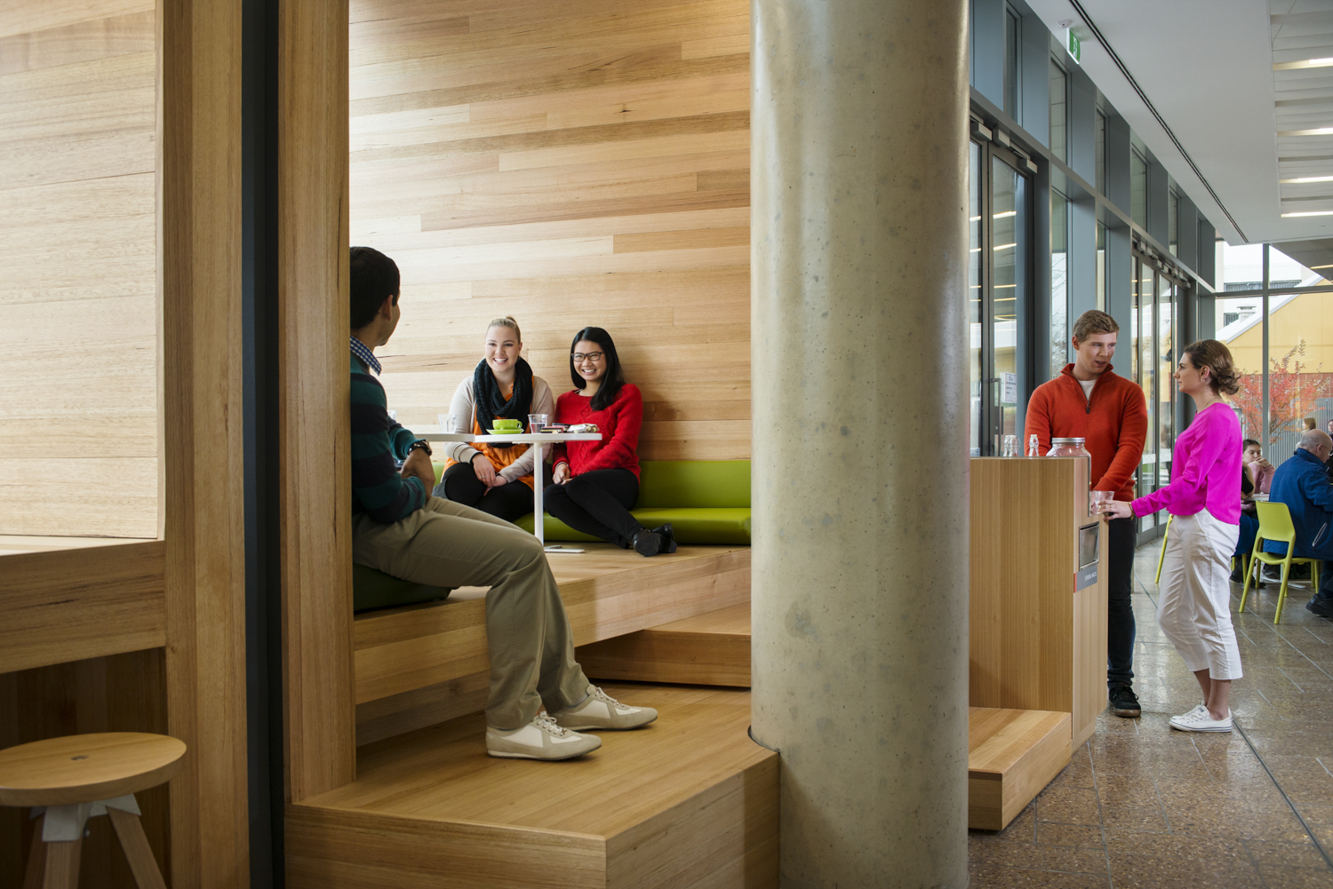 Fill the foreground to background with people to make the space feel multi-purpose. 