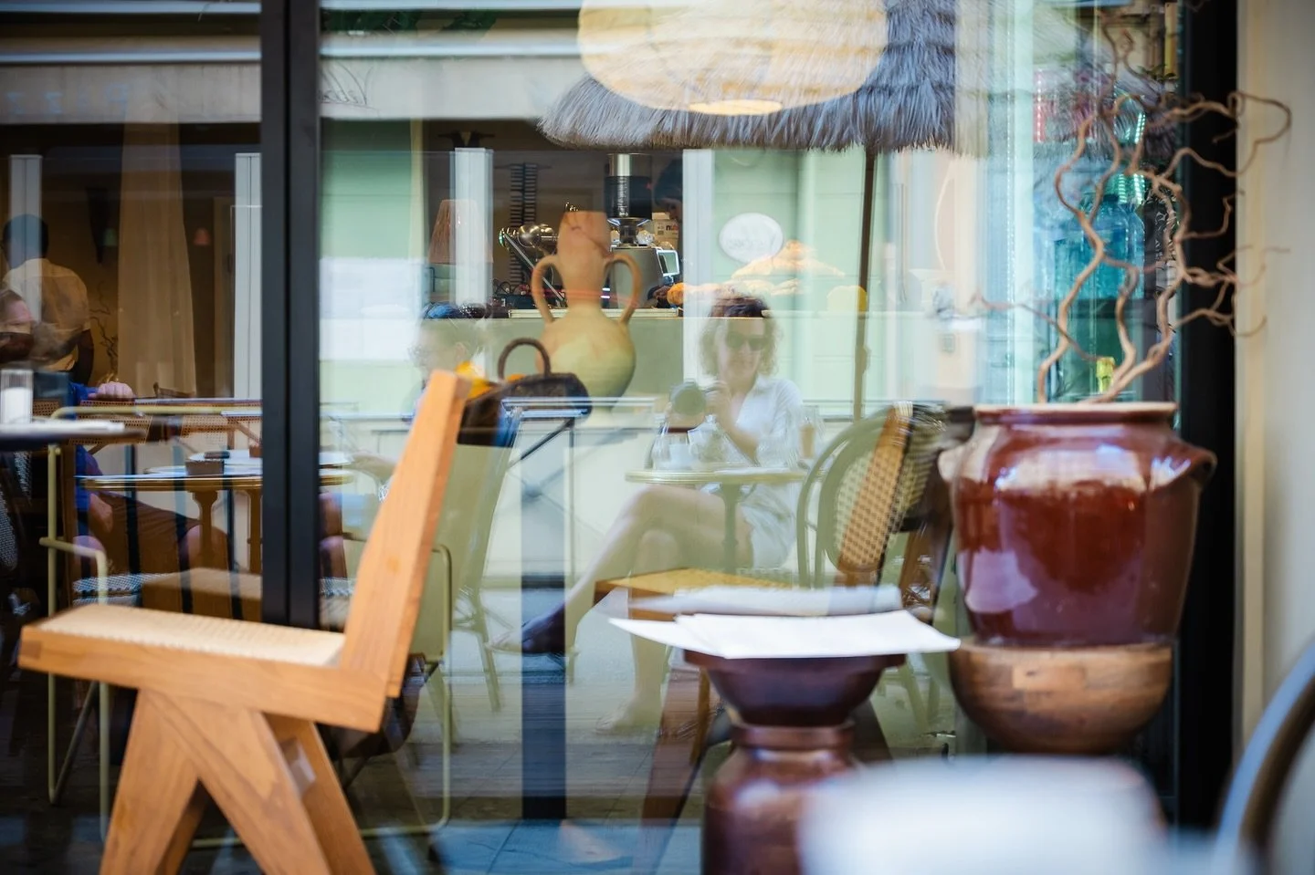 Through the glass, somewhere between me and the world.