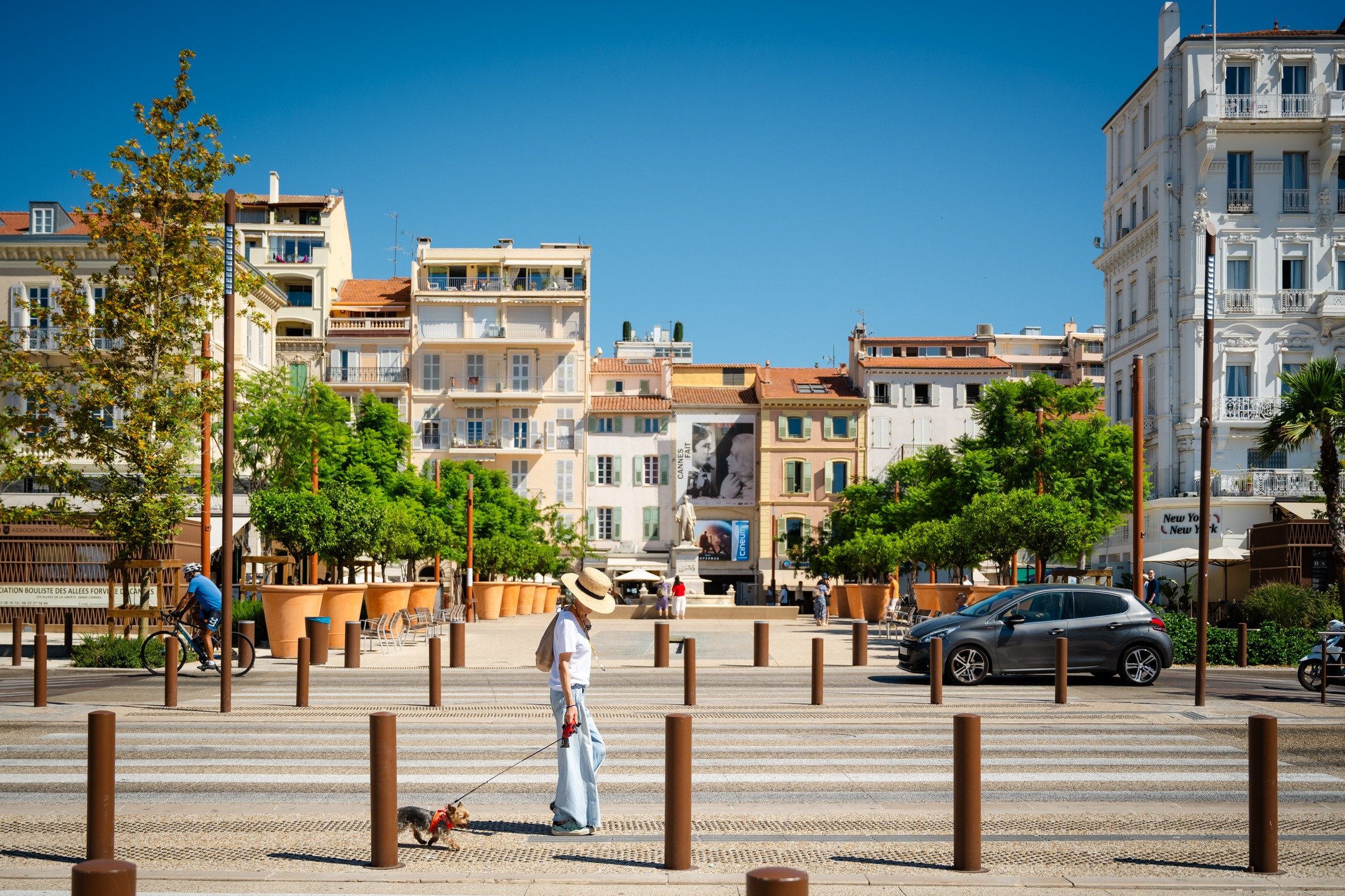 Cannes, France. All the money and glitz - and this is what I love. The moments, the daily life that continues.