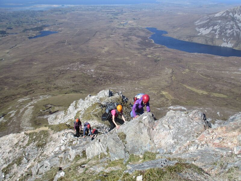 Errigal group - Women With Altitude participants scrambling up the north ridge of Errigal, with Altan Lough in background, photo Colette Mahon..jpg