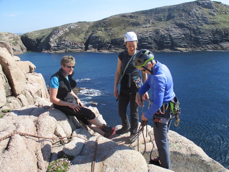 Gola climbers – Ursula Timmins (Waterford), Briar Harvey (UK) and Colette Mahon (Wexford) sorting out their ropework at the top of a climb on Gola Island, photo Sylvia Kehoe (Wexford)..jpg