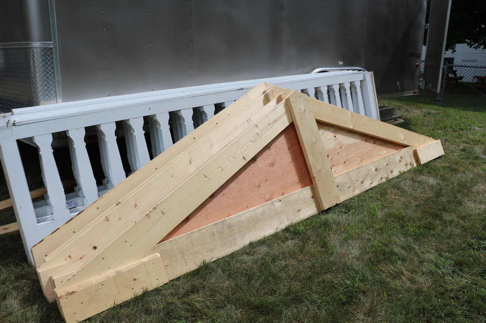   Trusses ready for the new roof, which will seal the exposed tower base after the takedown.  