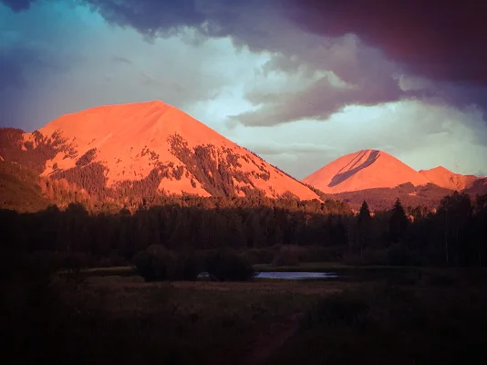 View from our campsite one evening. The peaks are the La Sal Mountains. Warner Lake is in the shadows near the bottom of the picture.