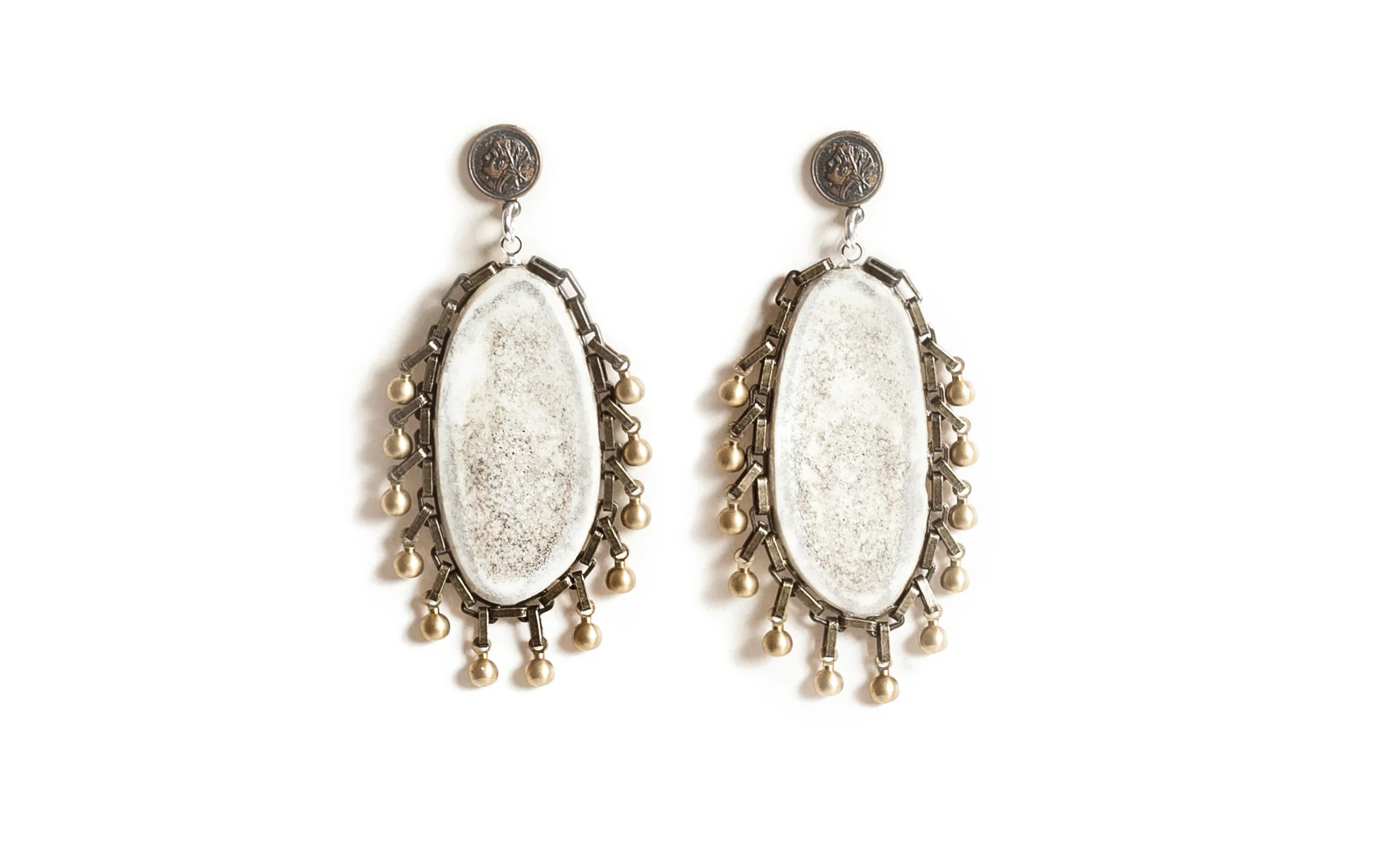 Because I am Northwest bound, I would have to don our specially crafted deer horn earrings. Embellished by Myrna Halpern Jewelry, but obtained from our "Northwest Man." He forages the woods for shed antlers and polishes them for us. STAY TUNED TO THE BLOG THIS SUMMER AND FOLLOW MY CREATIVE ADVENTURES IN BEAUTIFUL PORT TOWNSEND, WASHINGTON.