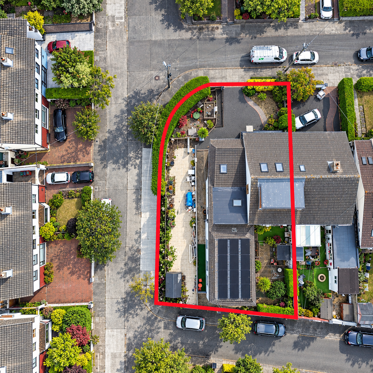 Aerial View of Red-Bordered Suburban Property.png