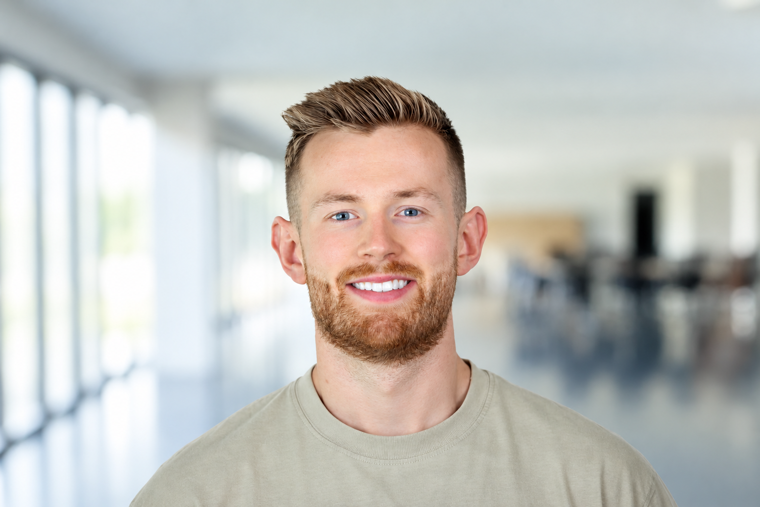 Friendly Corporate Headshot in Modern Office.png