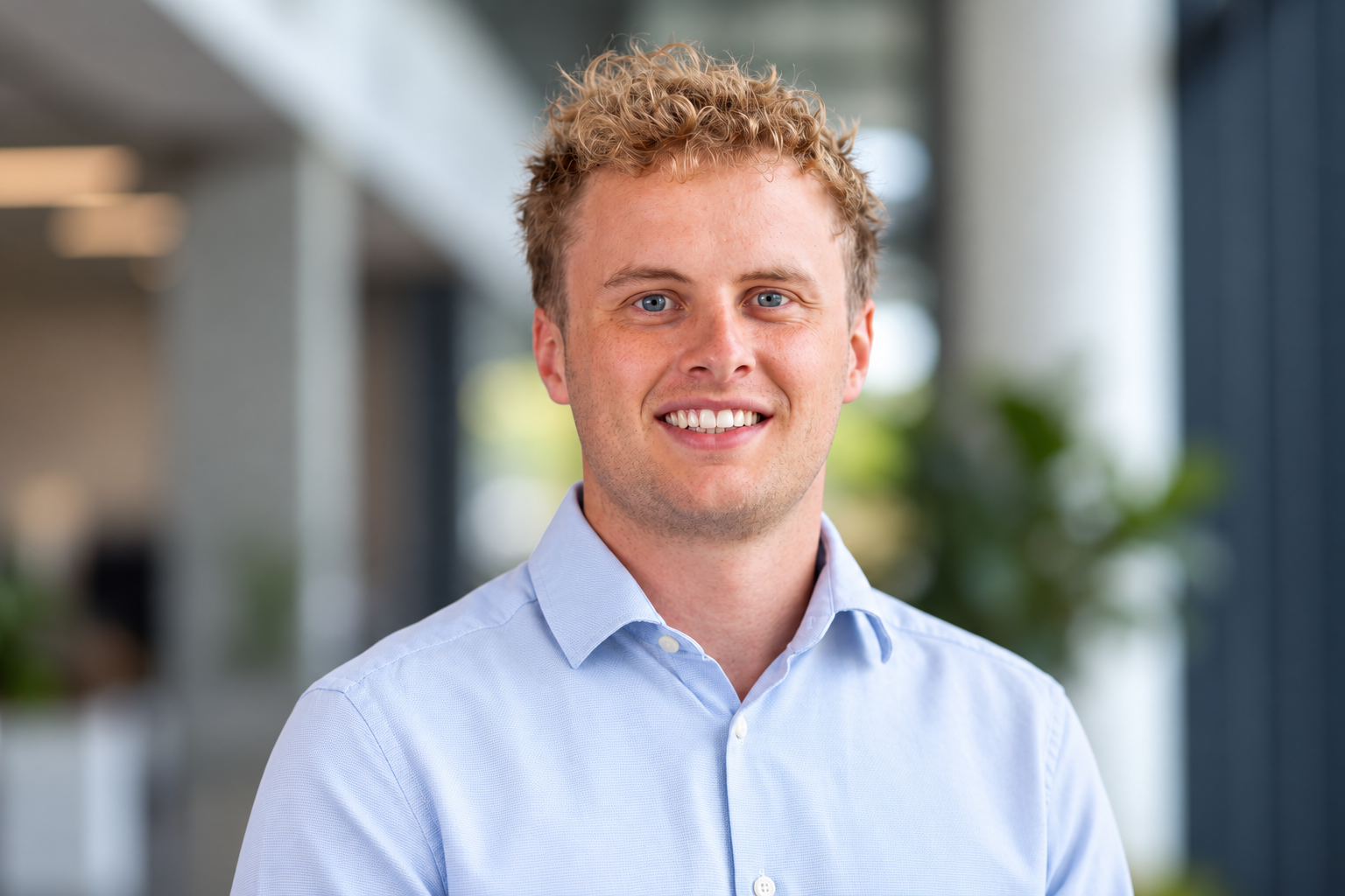 Professional Office Headshot with Bokeh Background.png