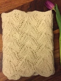 Snowy Walk cowl knit in white. The perfect accessory for your wardrobe as we transition from winter (snow) to spring (tulip). 