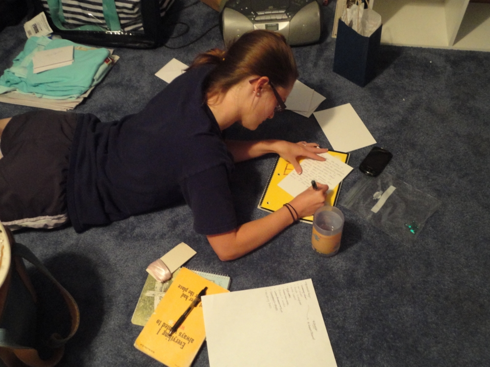 Me the night before our wedding writing letters to my bridesmaids and trying to finish my vows! :)