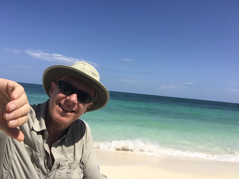 here, I "Settle into" the moment, as if pulling away a veil the separates me from life, which then allows me to reconnect with the world through my senses.