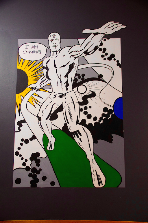 the work of "Chalk Talk," a cartoon artist in Wollongong, Australia who drew this on a Cafe wall.