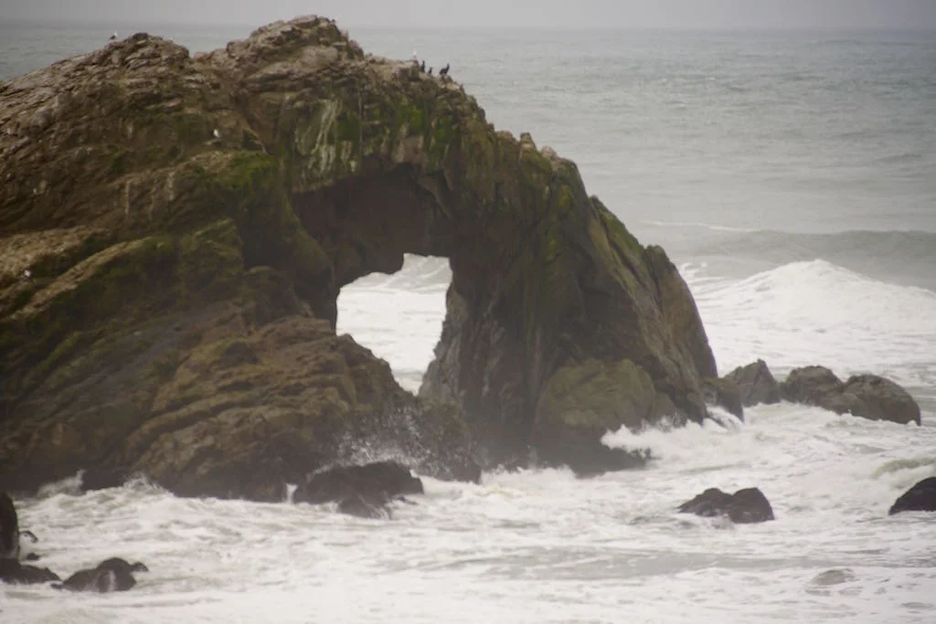 photo taken at the cliff house in san francisco. the heart shape in the rock appeared only when viewed from a certain angle. To me, this symbolized our ability to frame the world in soulful ways. one meaning of the word soul is "coing from or belonging to the sea" (etymonline.co). one version of the word for soul in chineses translates into "sea of heart." This image combines the foundational symbolism of rock with the fluid imagery of sea: The heart anchored inthe soul.