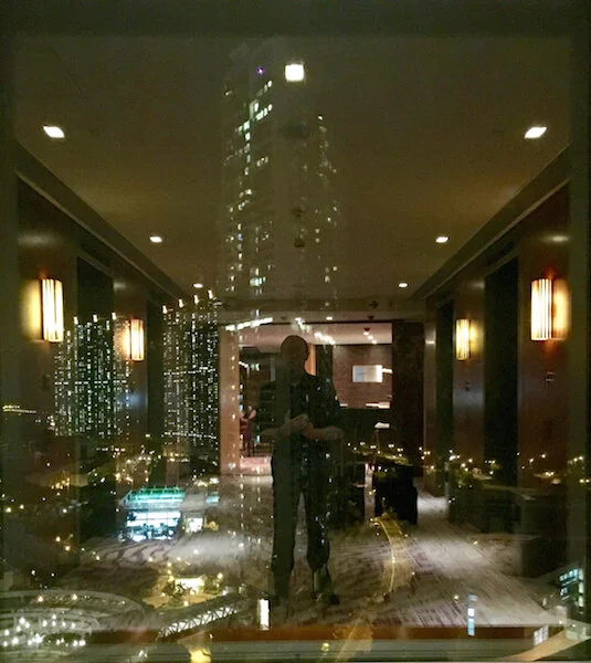 Me IN HK Night Window copy.jpg