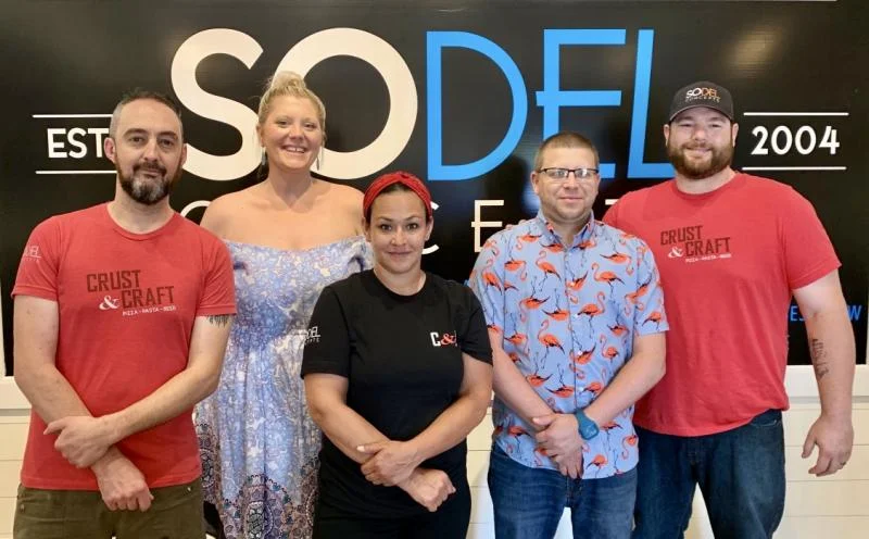 The management team at Crust & Craft includes some familiar faces. SoDel Concepts purchased the Midway restaurant in early 2019. Shown are (l-r) Chris Parks, corporate chef; Katie Sherman, general manager; Nina Maddox, executive chef; Wes Books, manager; and Dan Levin, director of operations. SUBMITTED PHOTO