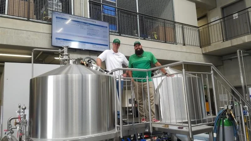 Touring the German company BrauKon, which made the equipment for Thompson Island Brewing Company in Rehoboth Beach are Matt Patton, left, and Jimmy Valm. SUBMITTED PHOTOS