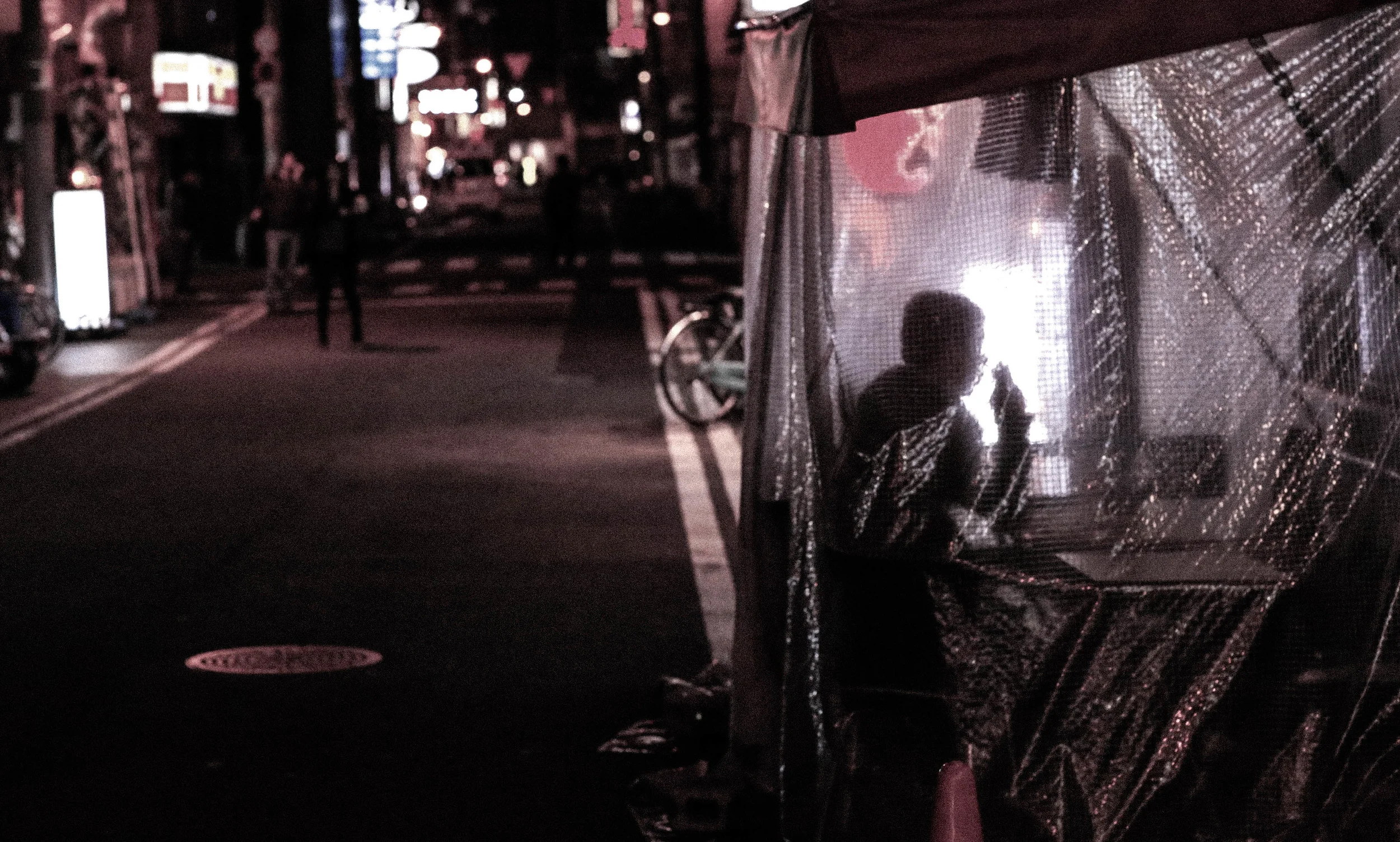 A man eats. Osaka.