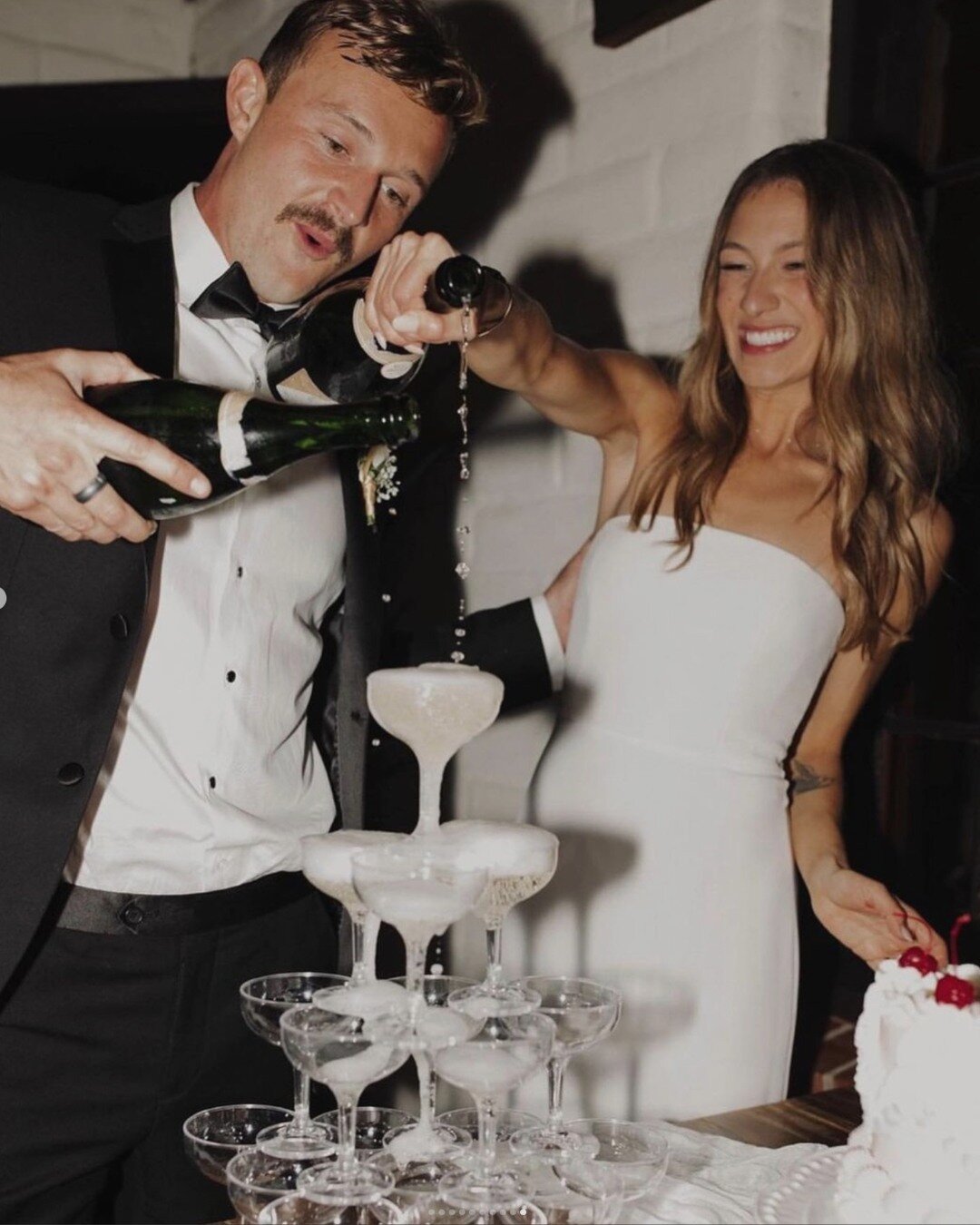 @alexanddragrecco gowns and champagne towers...it just feels right. ➡️ Swipe for the full look, major smiles included. ⁠
⁠
We will never get over how incredible it is to see our #realdresstheorybrides this happy. Congrats Jaylene!⁠
⁠
Photographed by 