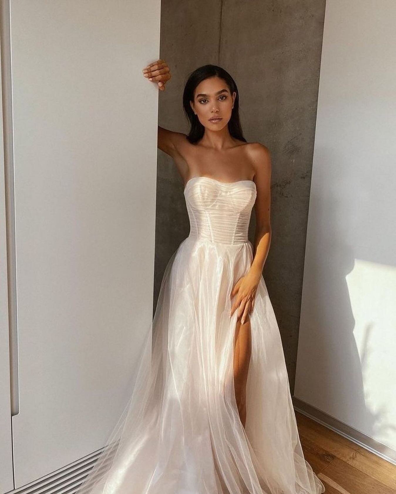 This Gala 501 dress by Galia Lahav @gl__gala is fit for a fairytale.✨⁠ ⁠
⁠
We're in love with the romance of the fabric paired with the high slit...we want to know, would you wear your hair up or down with this gown? Cast your vote in the comments ⬇️