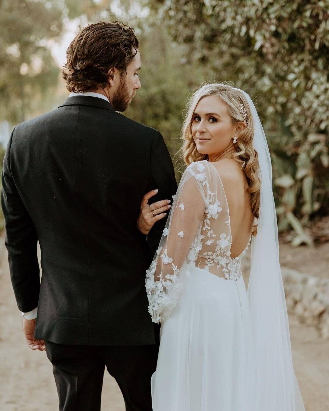 You're unique, your dress should be too. ⁠
⁠
We love how our bride Danielle looks in these floral applique sleeves by Rime Arodaky.⁠ The entire look is a dream. 💫⁠
⁠
Schedule your appointment at one of our Dress Theory locations to find the dress th