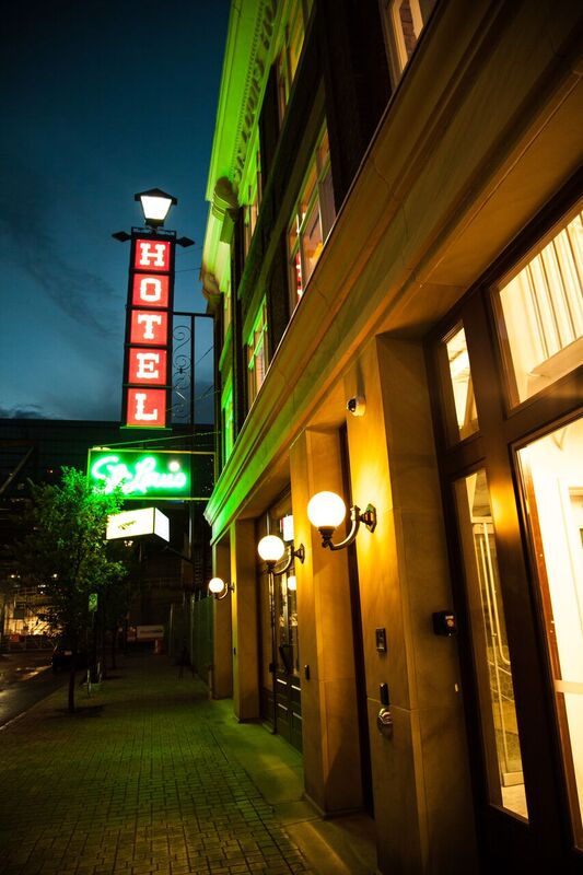 The iconic St. Louis Hotel sign now re-installed after being restored.
