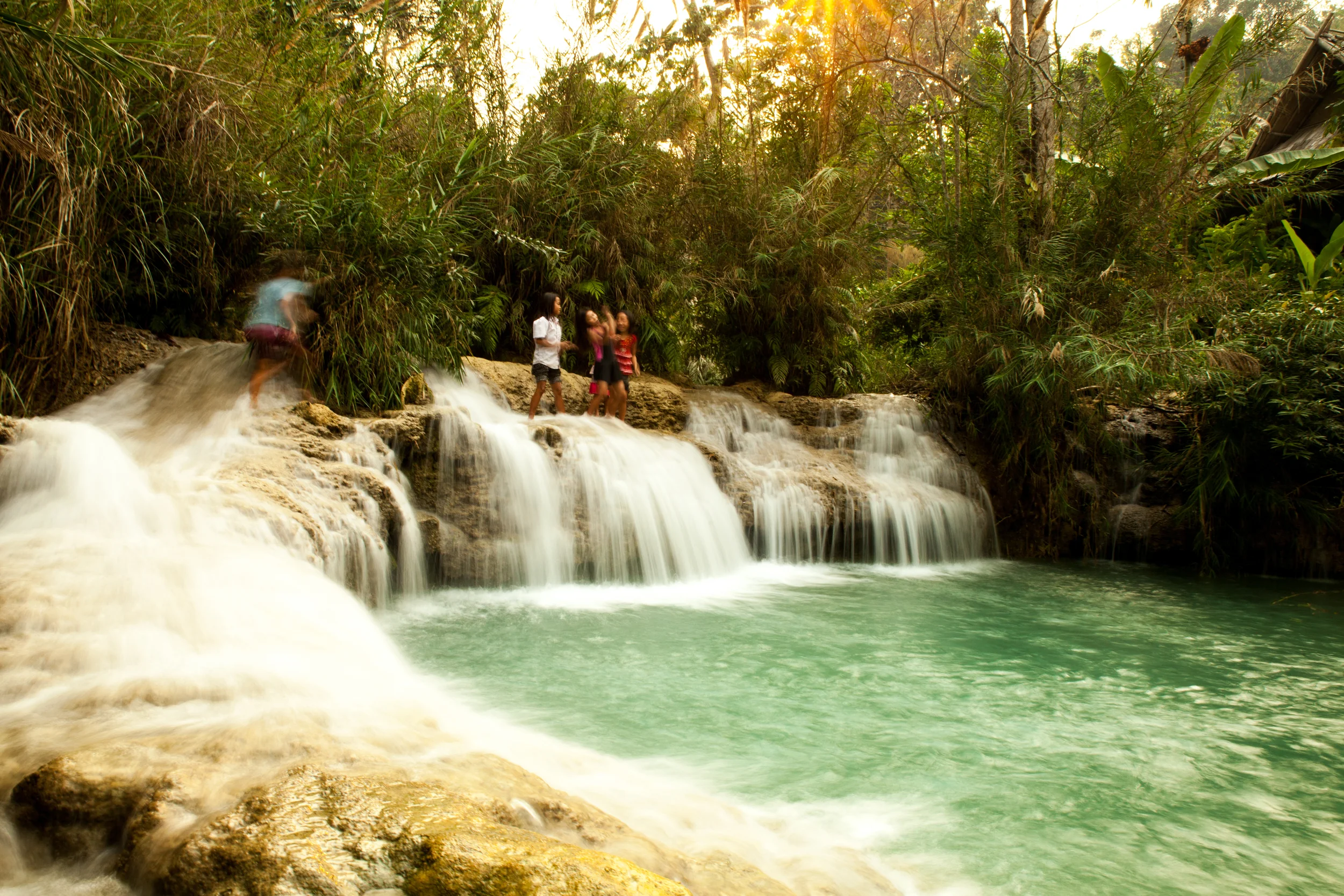 The lower reaches of the Kuang Si waterfall. These girls were having the most fun. Ever.