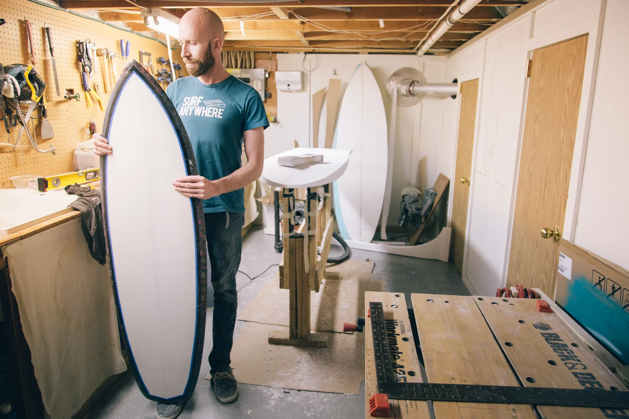 Adam showing off his babies first board he recently made.