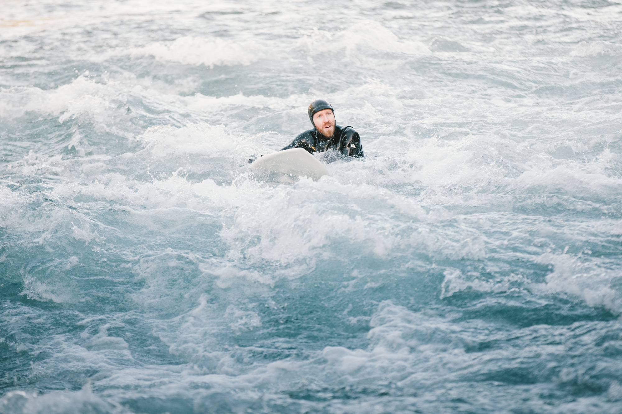 Adam after chasing his board down river.