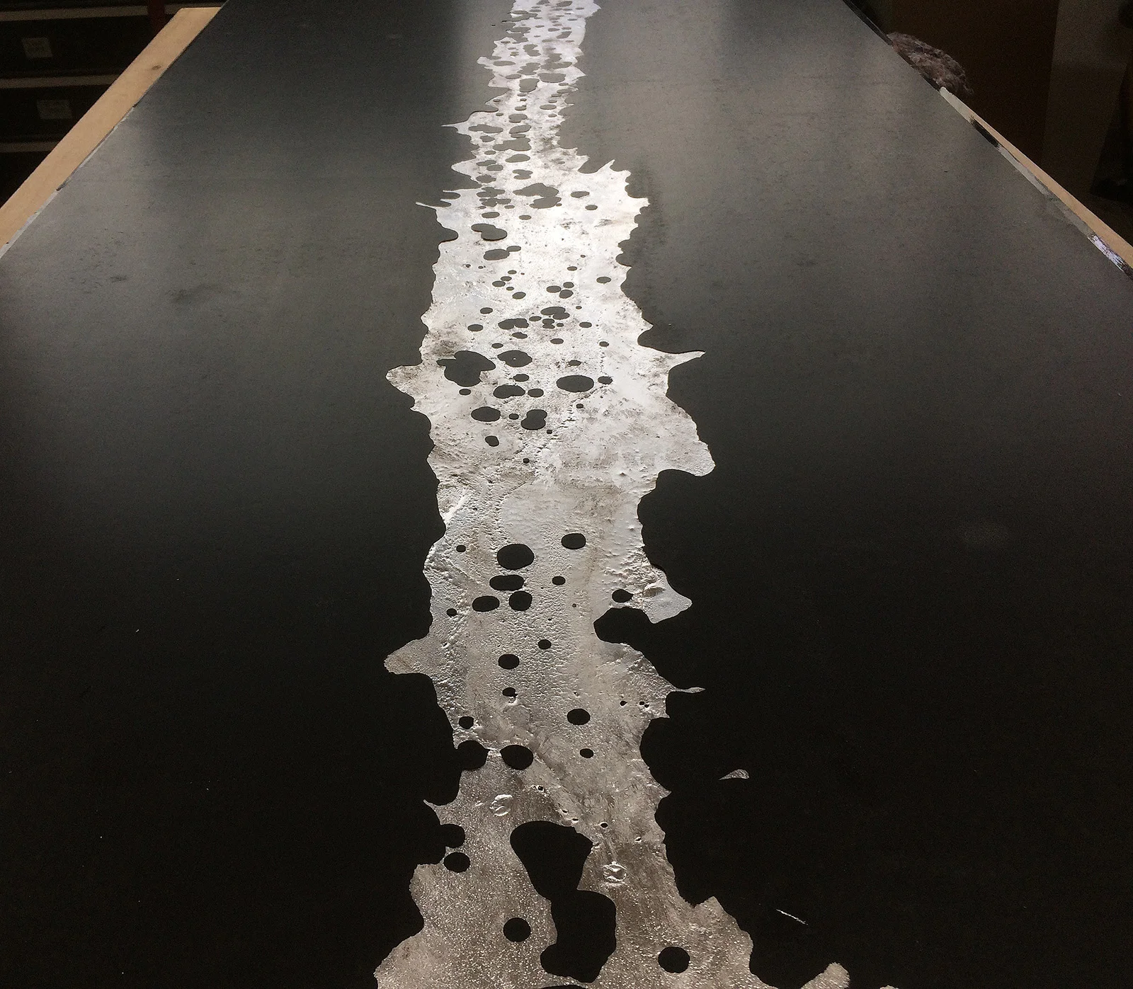 ether_atelier_thrown_molten_metal_graphite_table_img_6366.jpg