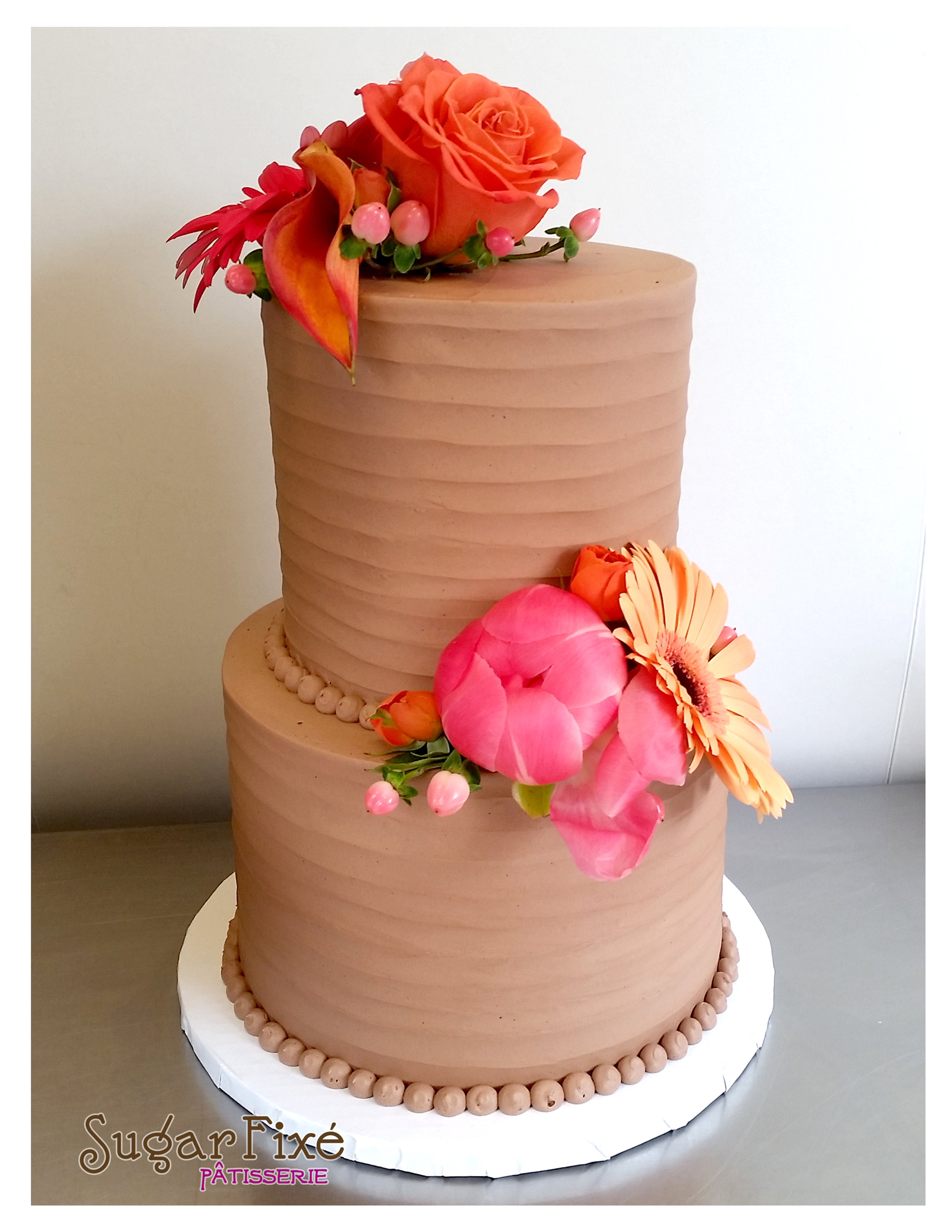 Chocolate Buttercream ripple texture fresh floral cake.jpg