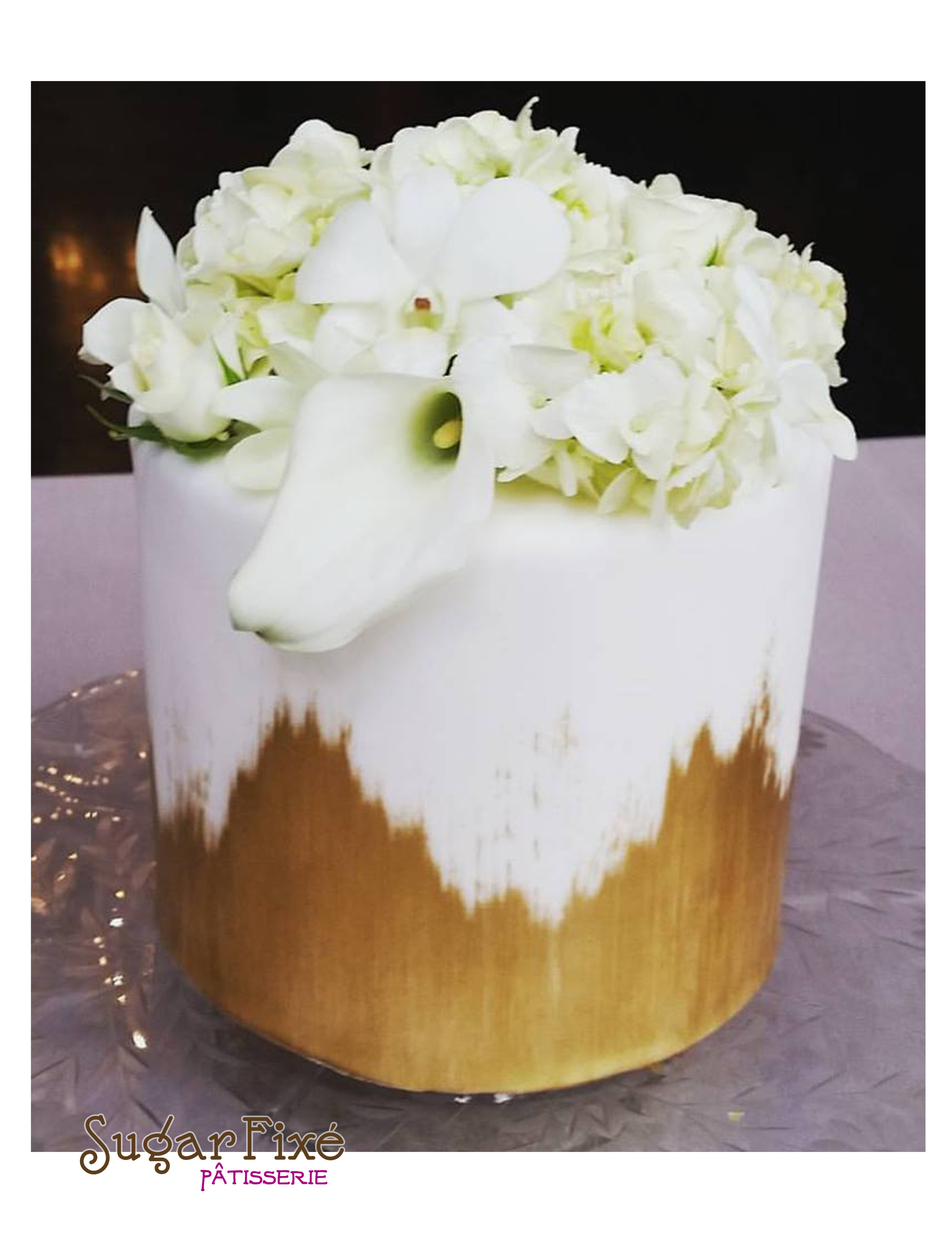 single tier gold brush fresh floral cake.jpg